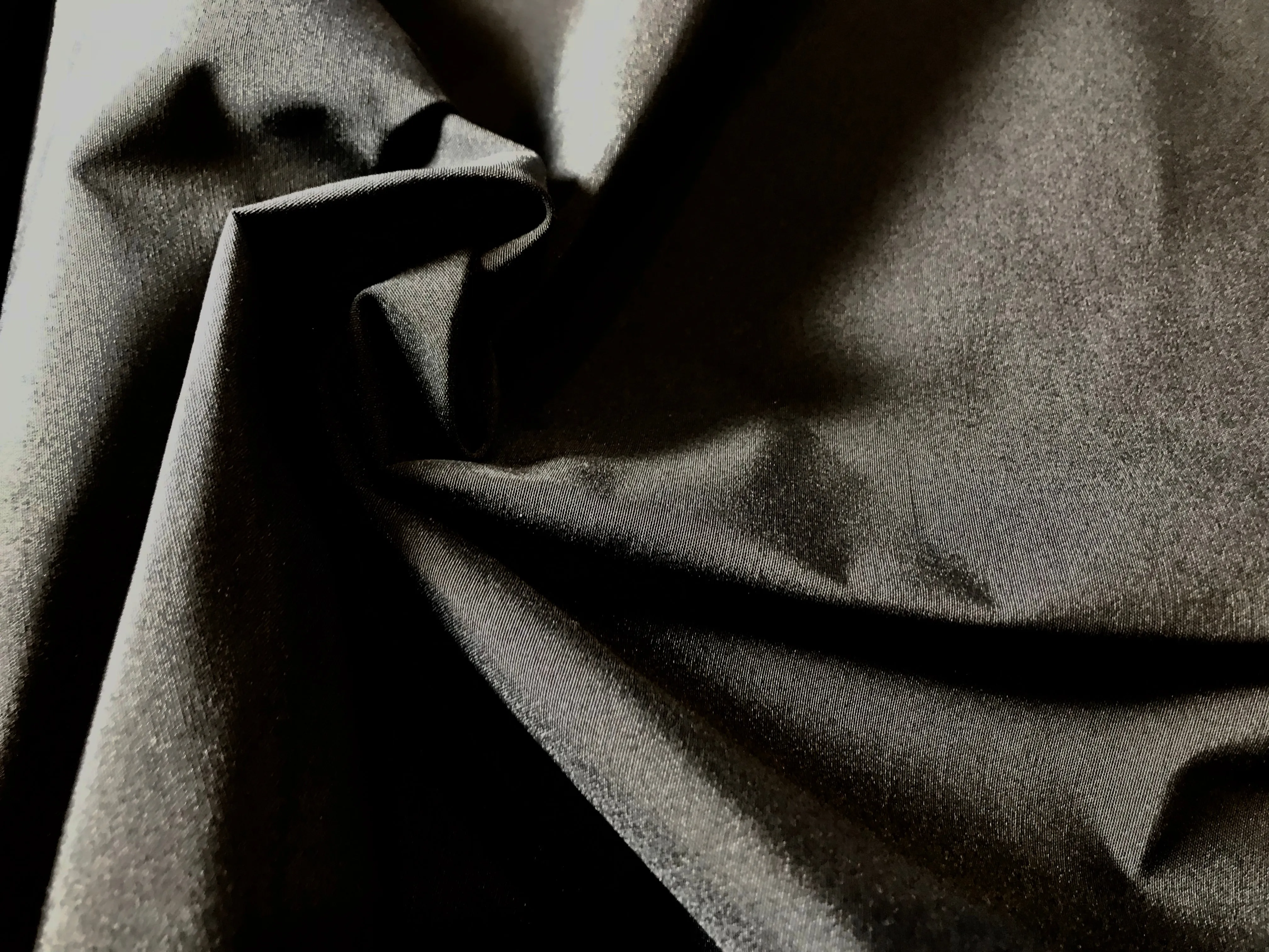 Black Arctica water resistant outerwear.   1/4 Metre Price