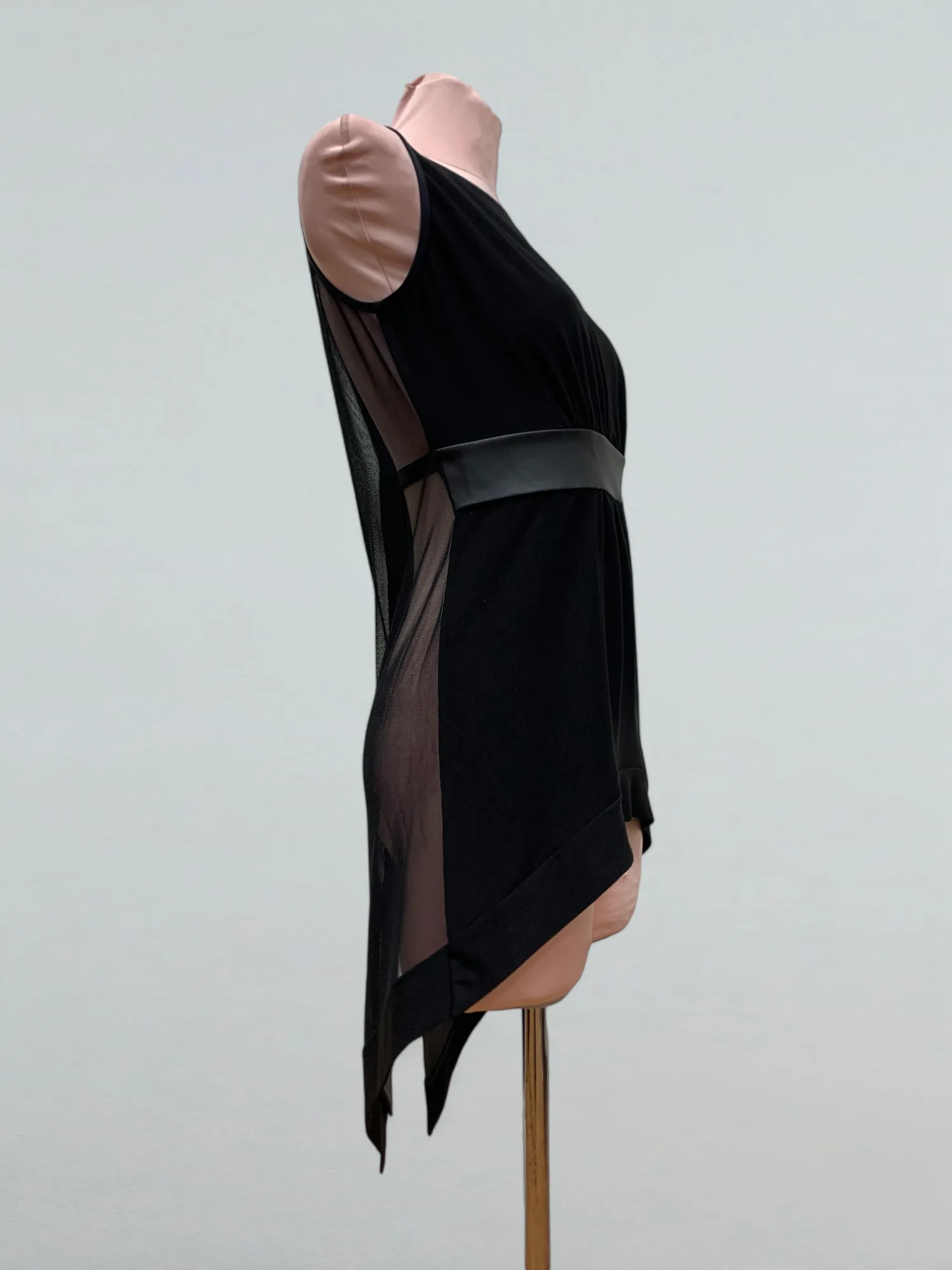 Sleeveless top with leather inserts