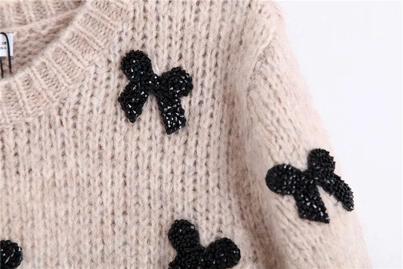SWEATER WITH BOWS
