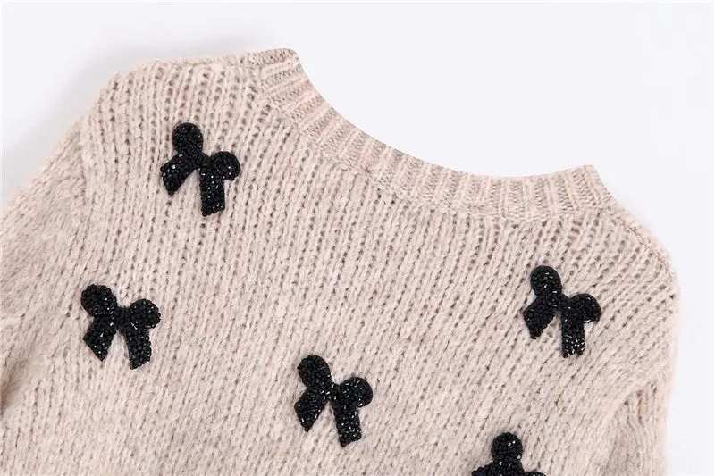 SWEATER WITH BOWS