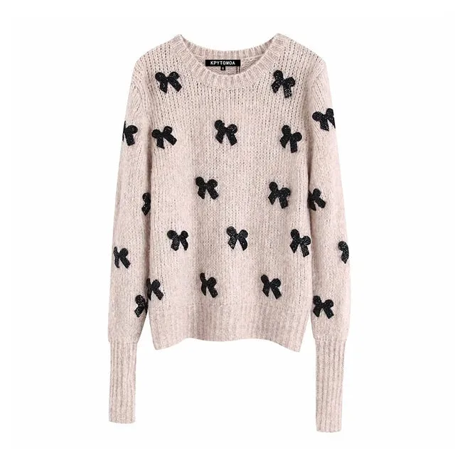 SWEATER WITH BOWS